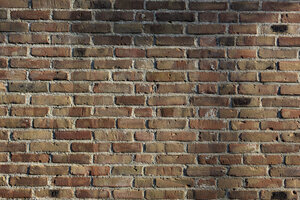 Textures and patterns of weathered brick wall in Noord-Brabant, 