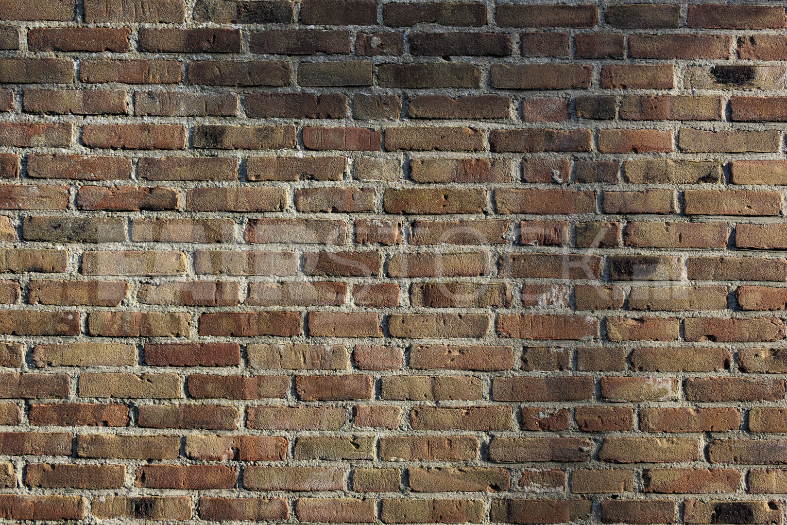 Textures and patterns of weathered brick wall in Noord-Brabant, 