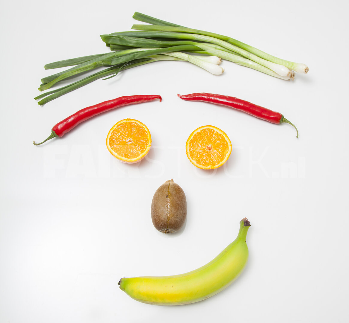 Vrolijk gezicht van groenten en fruit